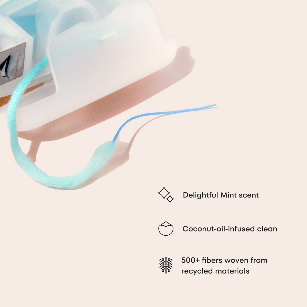 Product with text highlighting features like 'Delightful Mint scent' and 'Coconut-oil-infused clean'.