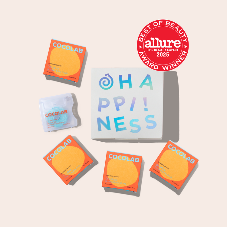 Cocolab products with 'Happiness' text and Allure Best of Beauty Award badge on a beige background