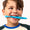 Child holding a blue toothbrush with a cartoon character on a white background
